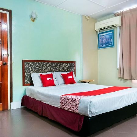 Oyo 89997 Kurnia Hotel Тавау Екстериор снимка