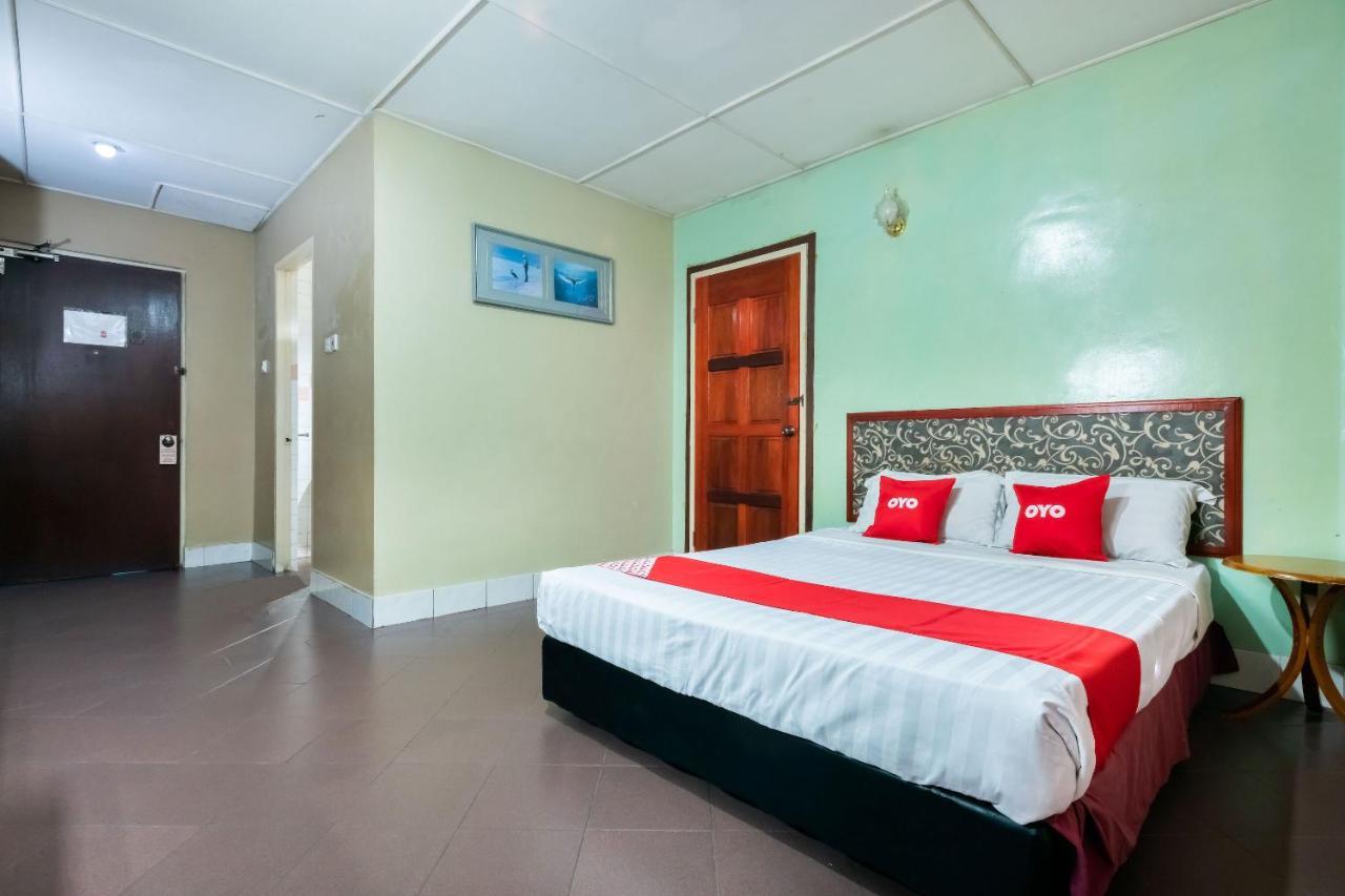Oyo 89997 Kurnia Hotel Тавау Екстериор снимка