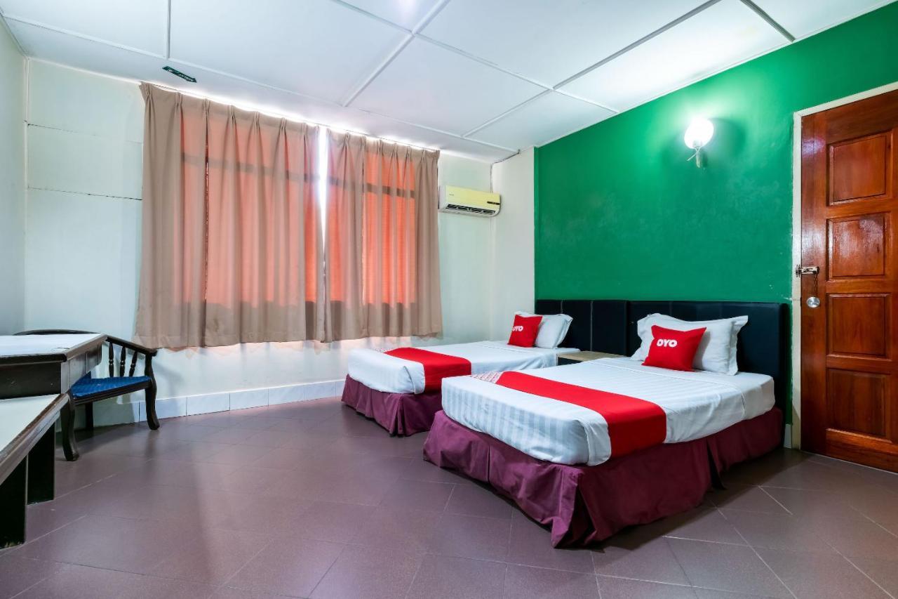 Oyo 89997 Kurnia Hotel Тавау Екстериор снимка