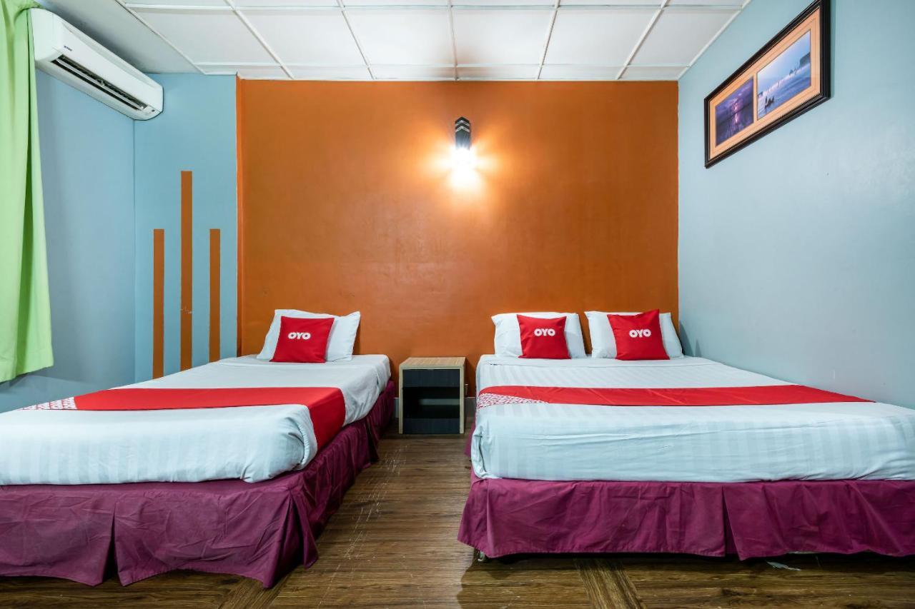 Oyo 89997 Kurnia Hotel Тавау Екстериор снимка