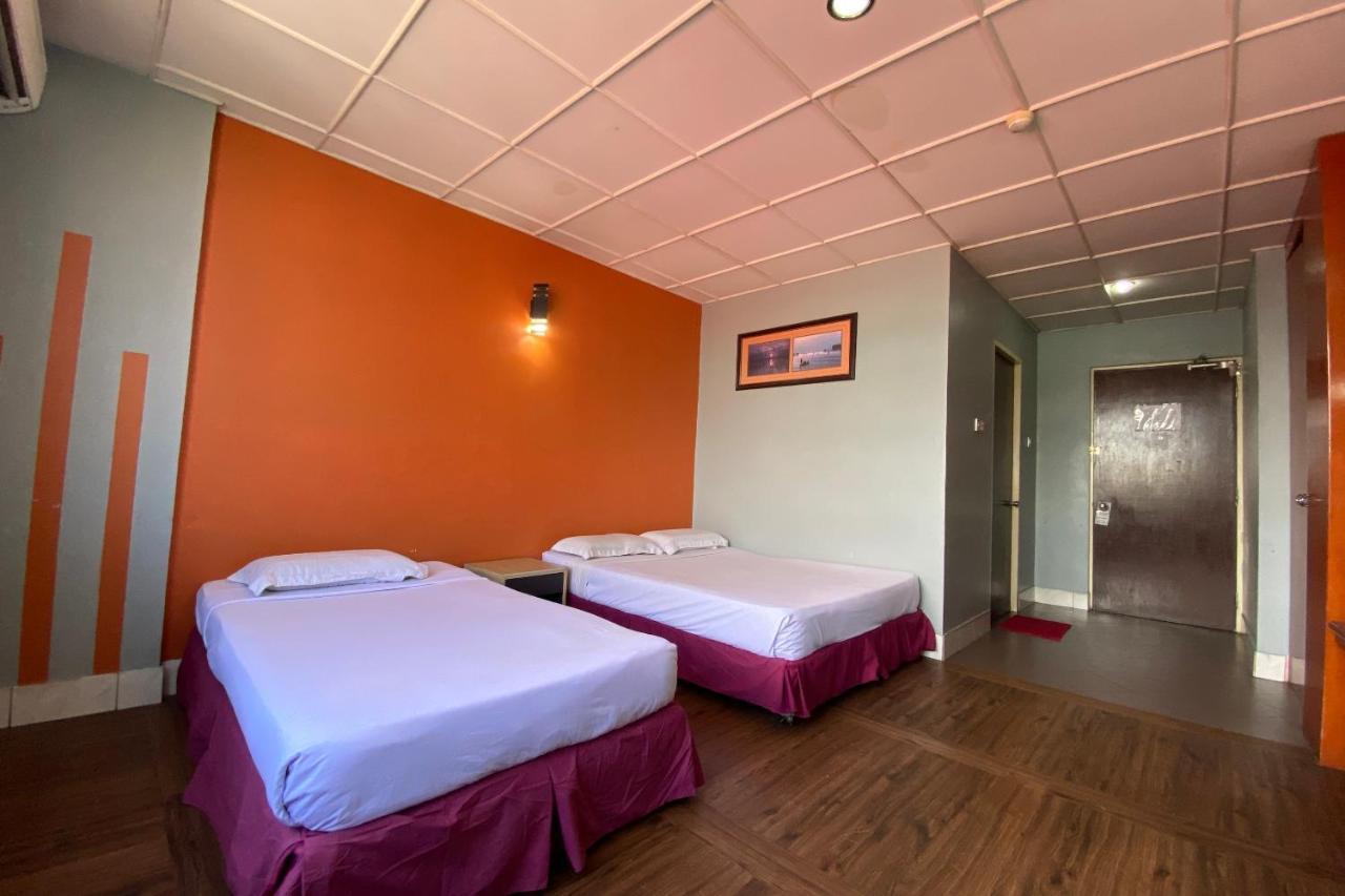 Oyo 89997 Kurnia Hotel Тавау Екстериор снимка
